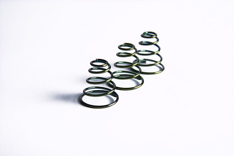 Kegeldruckfedern